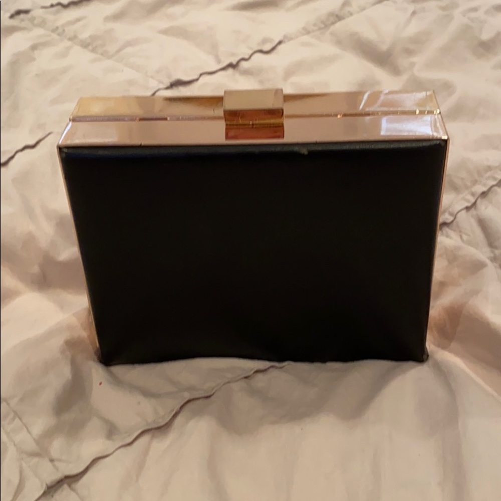 Small Black purse with gold accents